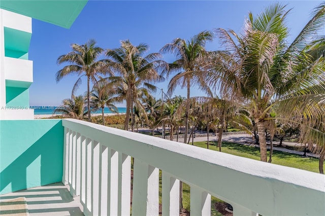 balcony featuring a water view