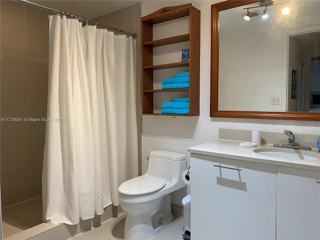 bathroom featuring curtained shower, toilet, tile patterned floors, and vanity