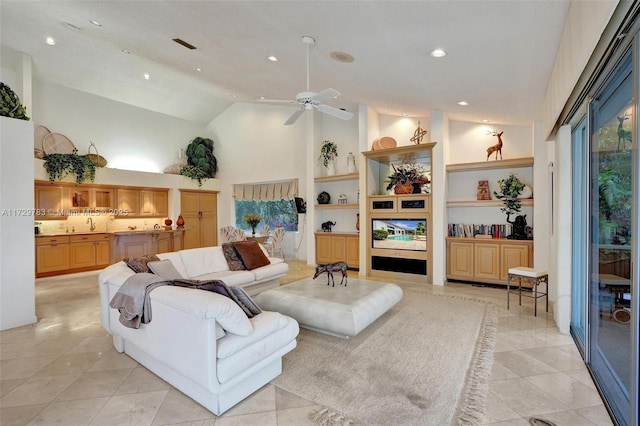 living room with high vaulted ceiling, built in shelves, light tile patterned floors, and ceiling fan