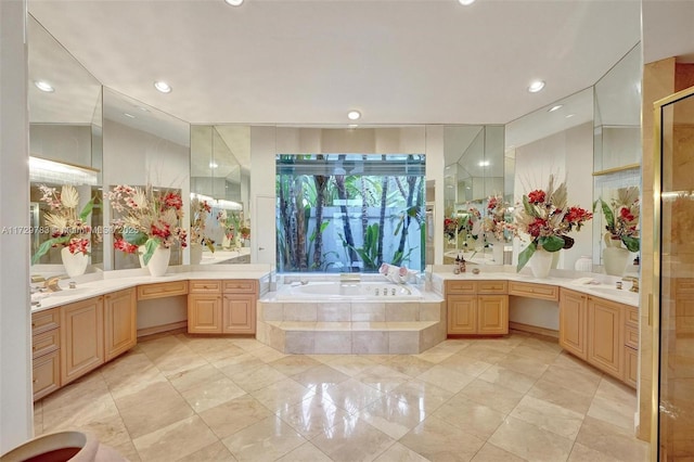 bathroom featuring plus walk in shower, vaulted ceiling, tile patterned floors, and vanity