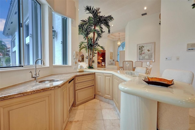 bathroom with sink and tile patterned floors