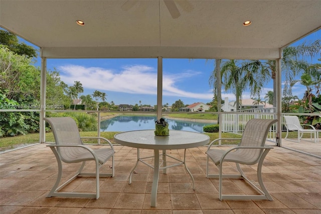 view of patio / terrace with a water view