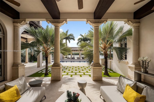 view of patio / terrace featuring ceiling fan and an outdoor hangout area