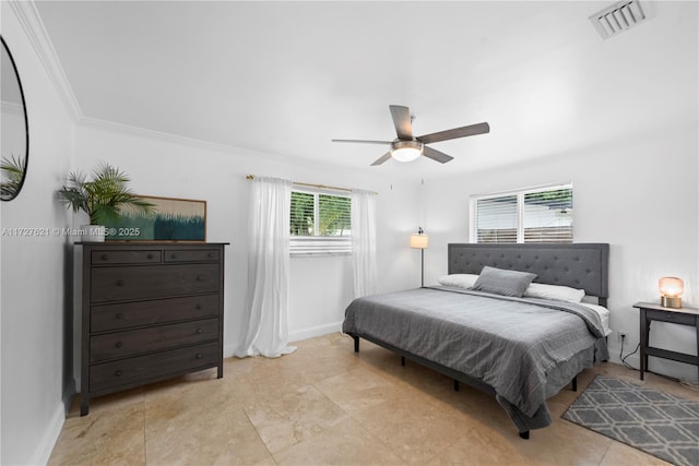 tiled bedroom featuring crown molding and ceiling fan