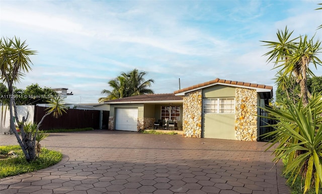 ranch-style home with a garage