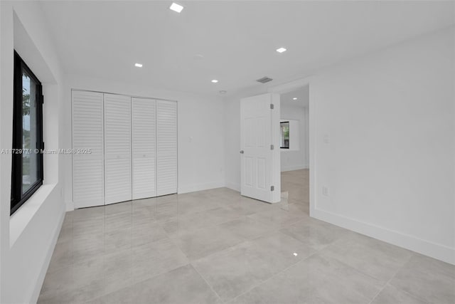 unfurnished bedroom featuring a closet