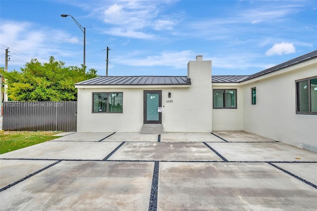 view of front of home featuring a patio