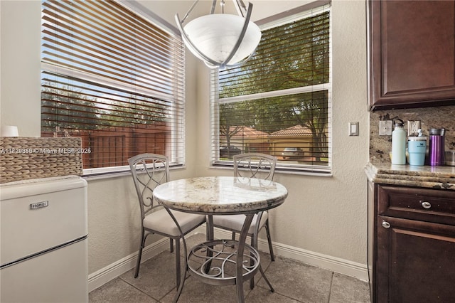 view of tiled dining area