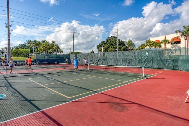 9400 N Hollybrook Lake Dr Unit 303, Pembroke Pines, FL 33025 - view of tennis court with community basketball court and fence