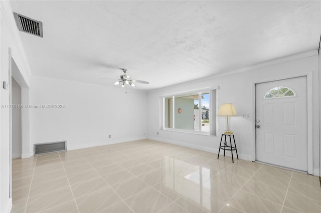 2070 NW 84th Ter, Pembroke Pines, FL 33024 - tiled entrance foyer with a ceiling fan, crown molding, baseboards, and a textured ceiling