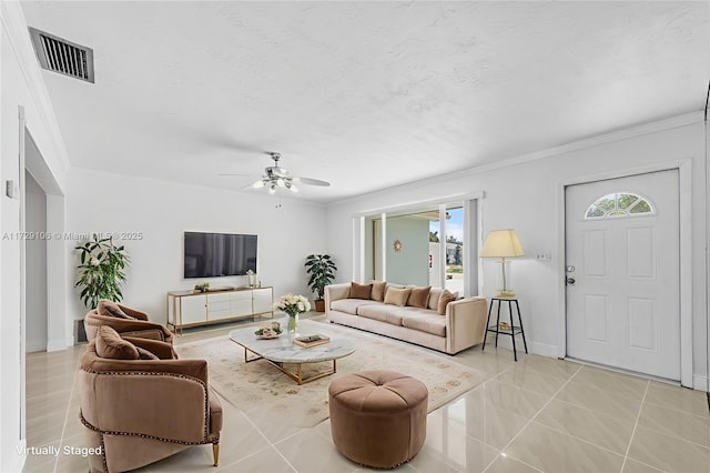 2070 NW 84th Ter, Pembroke Pines, FL 33024 - living area featuring ornamental molding, ceiling fan, light tile patterned floors, and baseboards