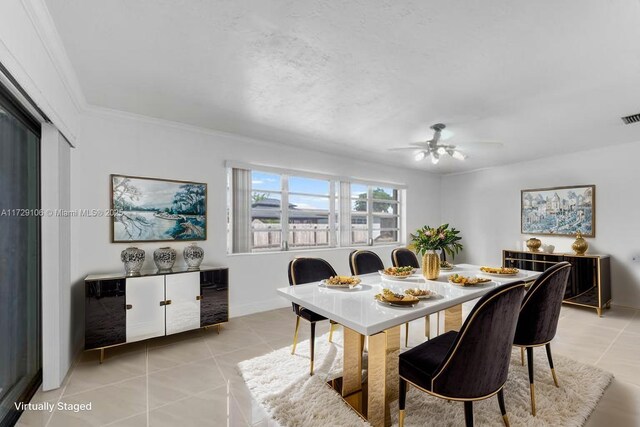 2070 NW 84th Ter, Pembroke Pines, FL 33024 - dining area featuring light tile patterned flooring, a ceiling fan, ornamental molding, and baseboards