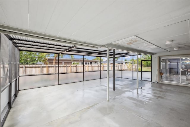 unfurnished sunroom with plenty of natural light