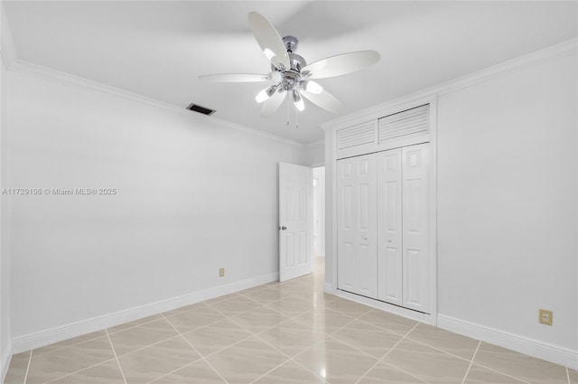 2070 NW 84th Ter, Pembroke Pines, FL 33024 - unfurnished bedroom with ornamental molding, a closet, light tile patterned floors, and a ceiling fan