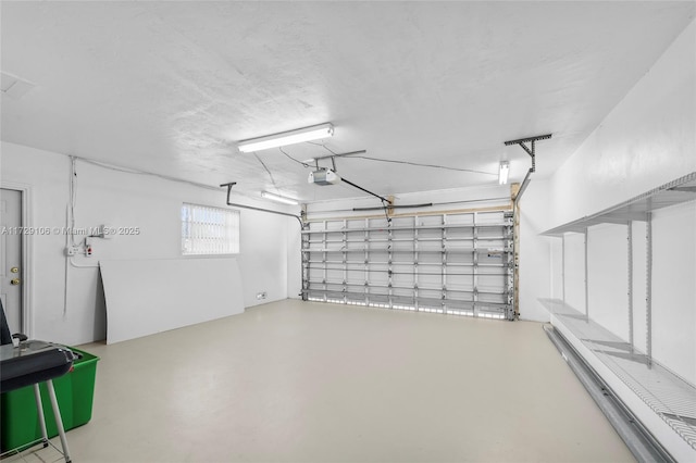 2070 NW 84th Ter, Pembroke Pines, FL 33024 - garage featuring a garage door opener