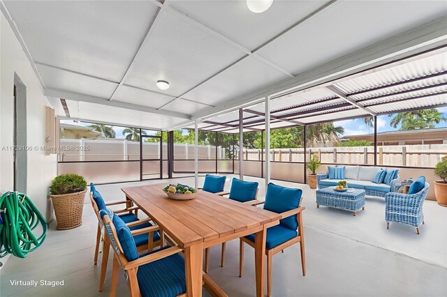 2070 NW 84th Ter, Pembroke Pines, FL 33024 - sunroom featuring an outdoor living space, outdoor dining area, and plenty of natural light