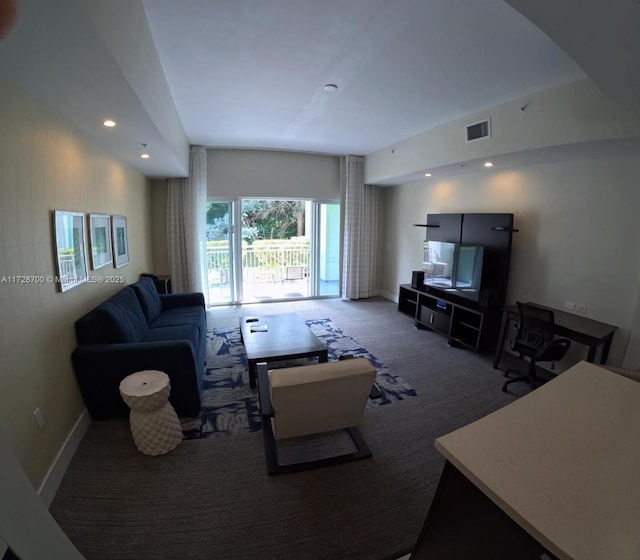 living room featuring dark carpet