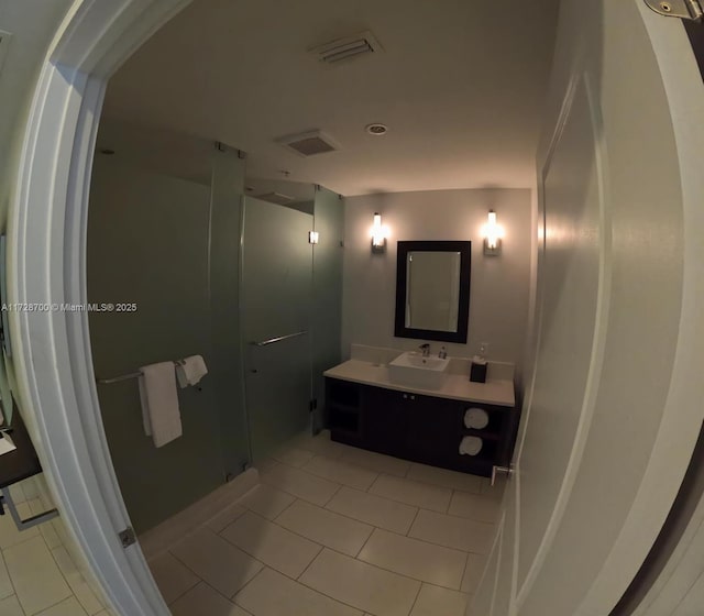 bathroom with vanity and tile patterned flooring