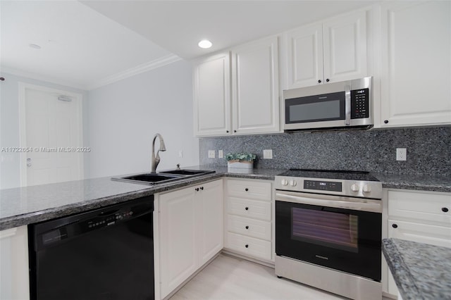 kitchen featuring white cabinets, stainless steel appliances, sink, backsplash, and ornamental molding