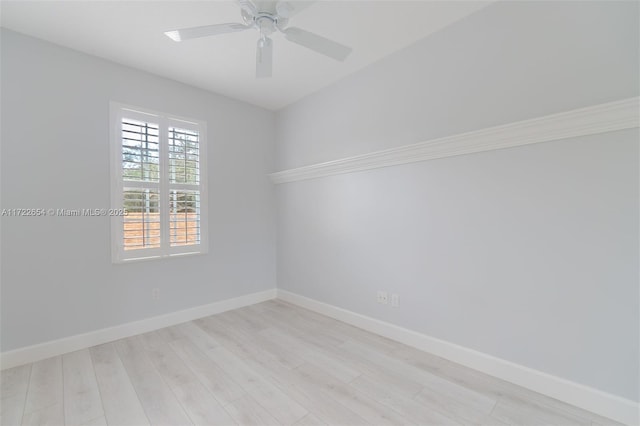 spare room with ceiling fan and light hardwood / wood-style flooring