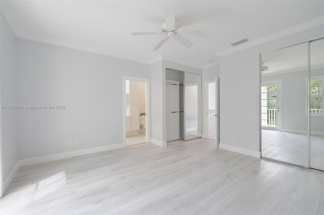 unfurnished bedroom with ceiling fan, light hardwood / wood-style floors, ensuite bathroom, and ornamental molding