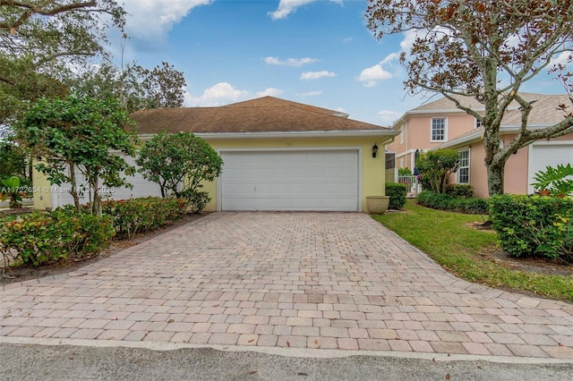 view of front of home featuring a garage