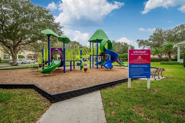 view of jungle gym featuring a yard