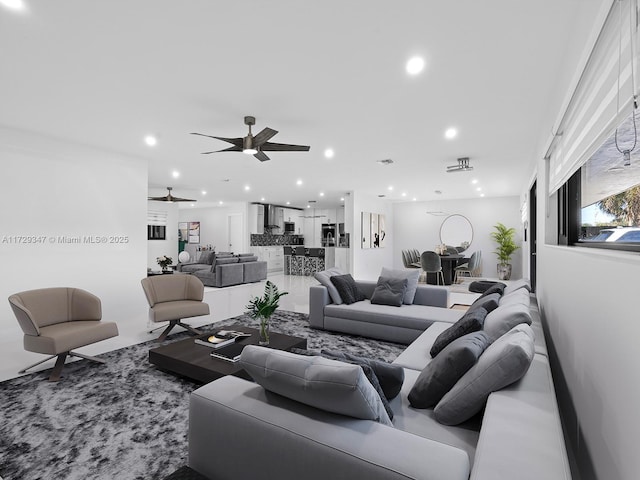 living room with ceiling fan