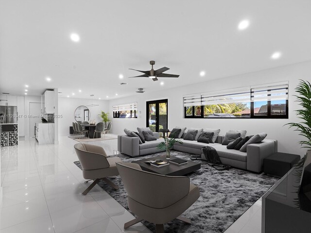 living room with ceiling fan and light tile patterned flooring