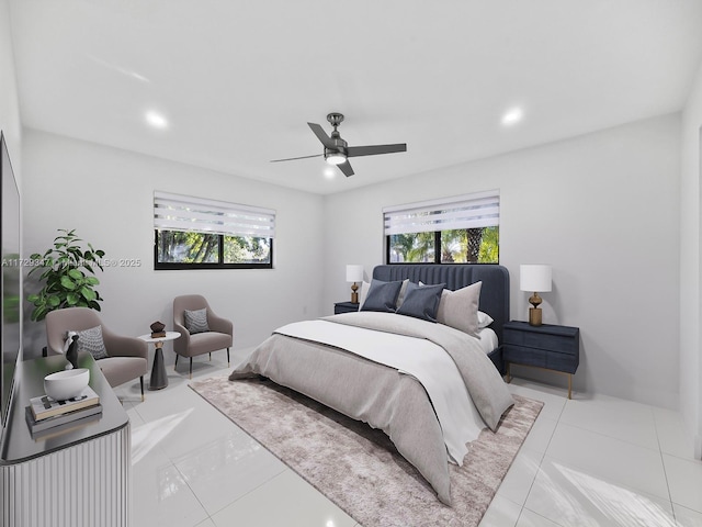 tiled bedroom featuring ceiling fan