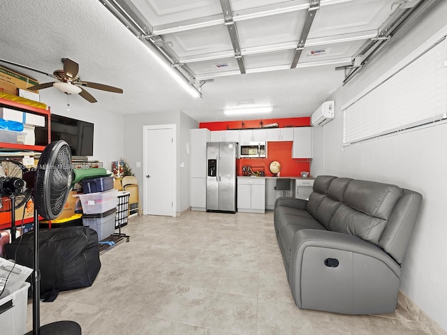 living room featuring a wall mounted air conditioner, ceiling fan, and a textured ceiling