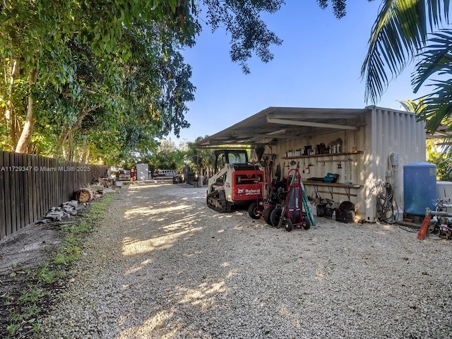 view of parking with a carport