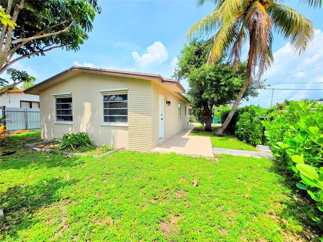 7200 NW 4th St, Miami, FL 33126 - back of property featuring stucco siding and brick siding