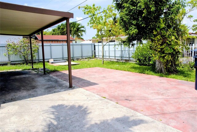 7200 NW 4th St, Miami, FL 33126 - fenced backyard featuring a patio