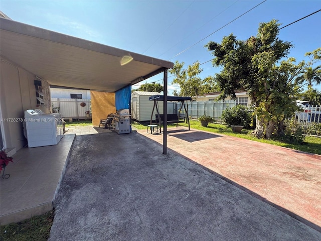 view of patio / terrace with a storage shed