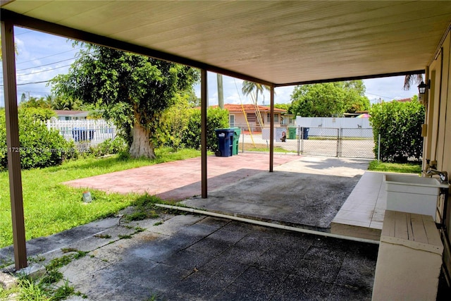 7200 NW 4th St, Miami, FL 33126 - view of patio featuring a carport