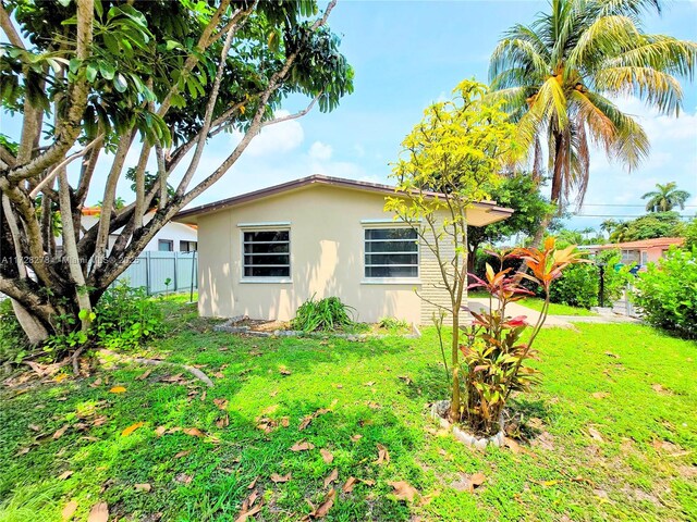 7200 NW 4th St, Miami, FL 33126 - view of property exterior featuring stucco siding