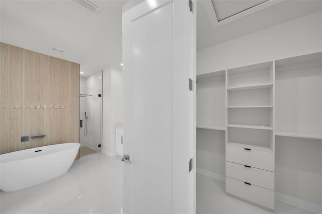 bathroom with shower with separate bathtub