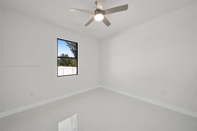 spare room with ceiling fan