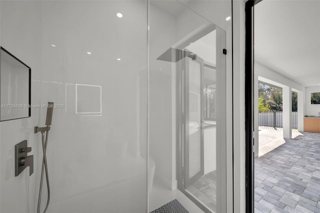 bathroom featuring walk in shower