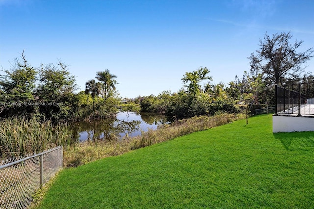 view of yard with a water view