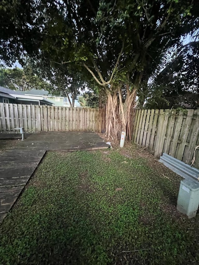 view of yard with a deck