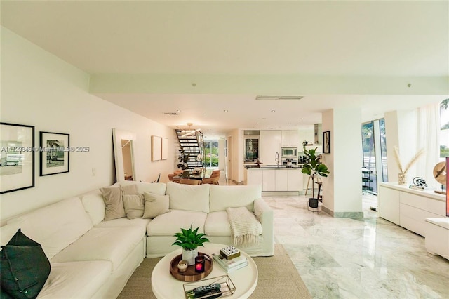 living room featuring sink