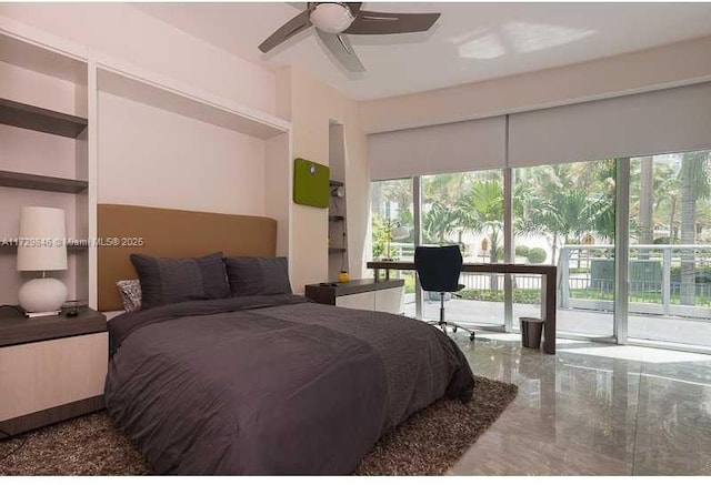 bedroom featuring ceiling fan and access to outside