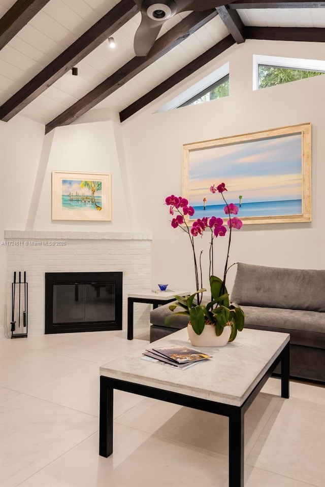 tiled living room with lofted ceiling with beams