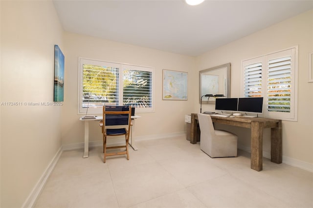 office space with light tile patterned flooring