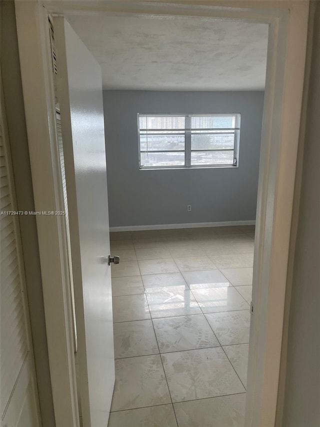 unfurnished room with a wealth of natural light