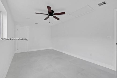 spare room featuring ceiling fan