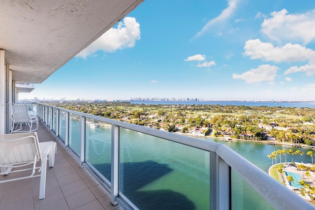 balcony featuring a water view