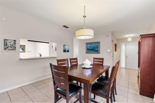 view of tiled dining space